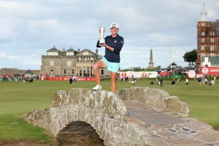 Stacy Lewis holds the Women's British Open trophy at St Andrews in 2013