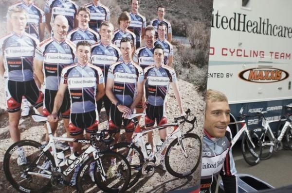 United Healthcare rider Brad White poses next to the photo of his teammates.