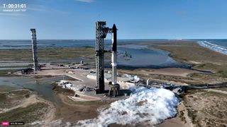 A SpaceX Starship rocket atop its booster at launchpad while fueling for Flight 6