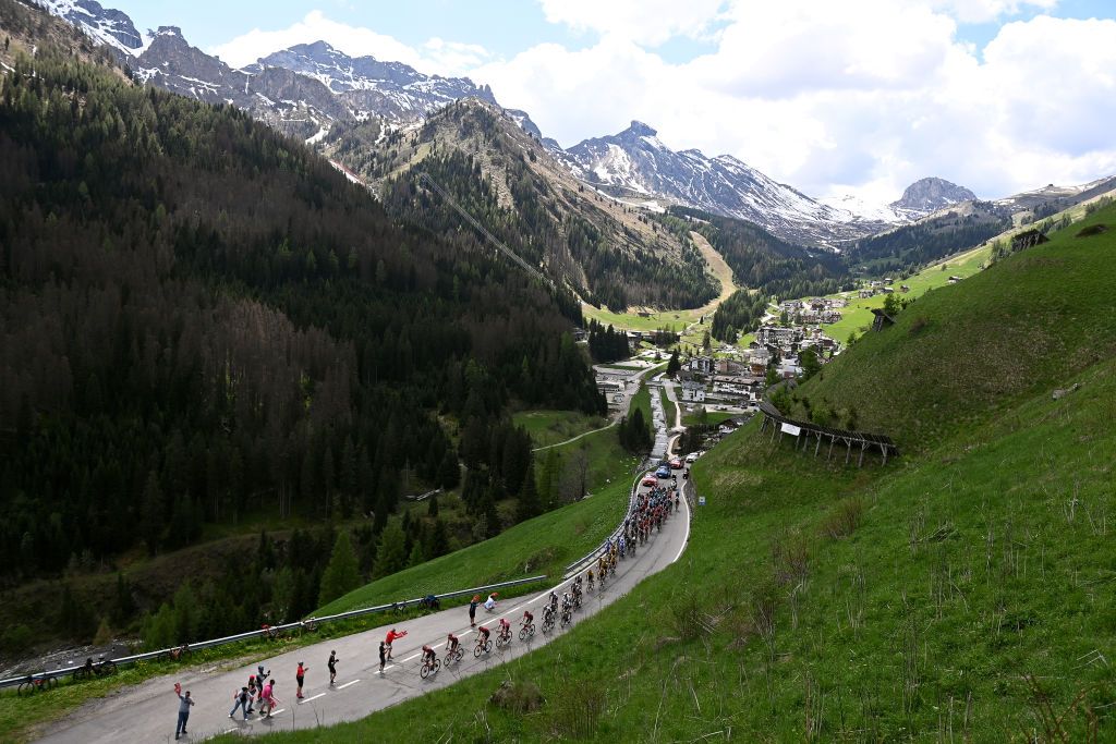 TRE CIME DI LAVAREDO ITALY MAY 26 Joo Almeida of Portugal and UAE Team Emirates White Best Young Rider Jersey Geraint Thomas of The United Kingdom and Team INEOS Grenadiers Pink Leader Jersey and a general view of the peloton competing climbing to the Passo Campolongo 1875m during the 106th Giro dItalia 2023 Stage 19 a 183km stage from Longarone to Tre Cime di Lavaredo 2307m UCIWT on May 26 2023 in Tre Cime di Lavaredo Italy Photo by Tim de WaeleGetty Images