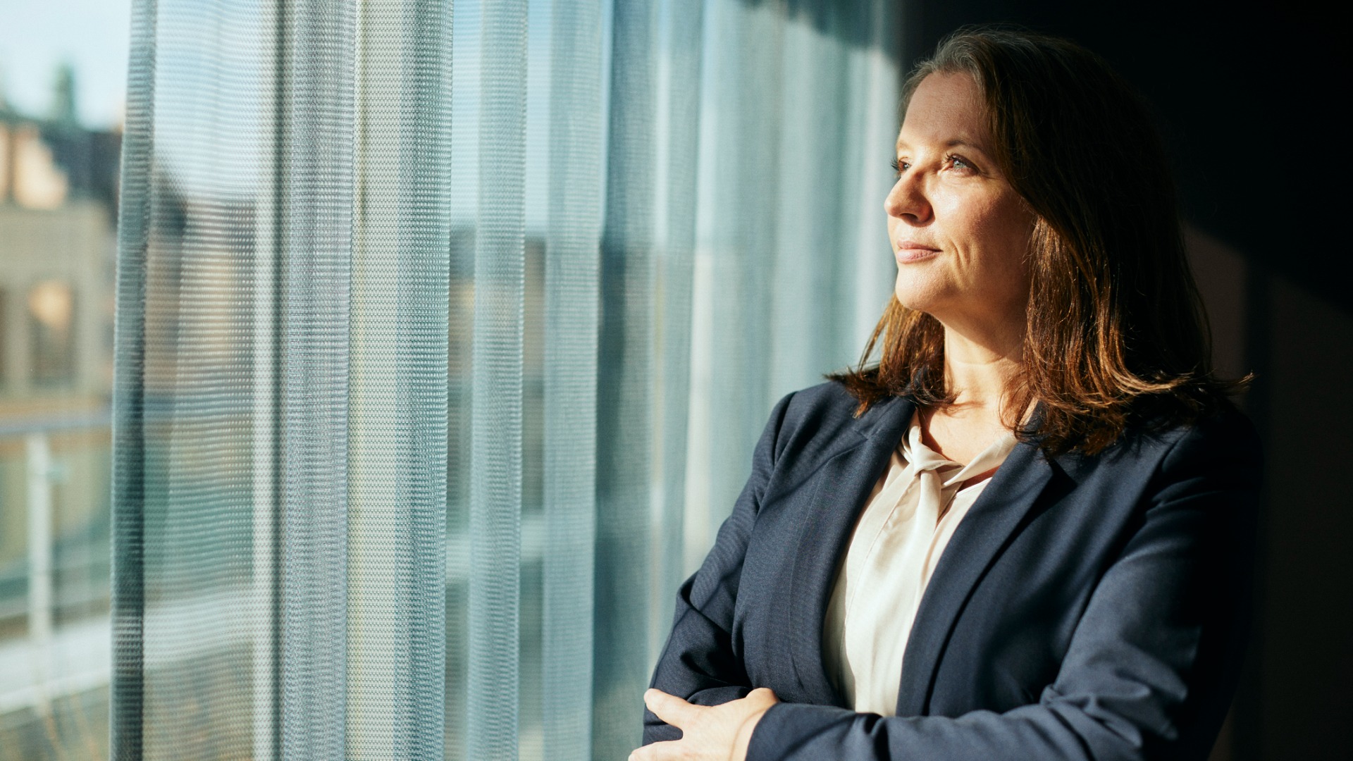 Woman looking out of the window