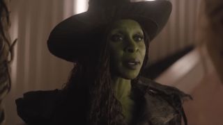 Elphaba wearing her hat and talking to Glinda in Wicked: For Good