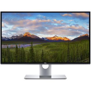 A Dell UltraSharp UP3218K against a white background