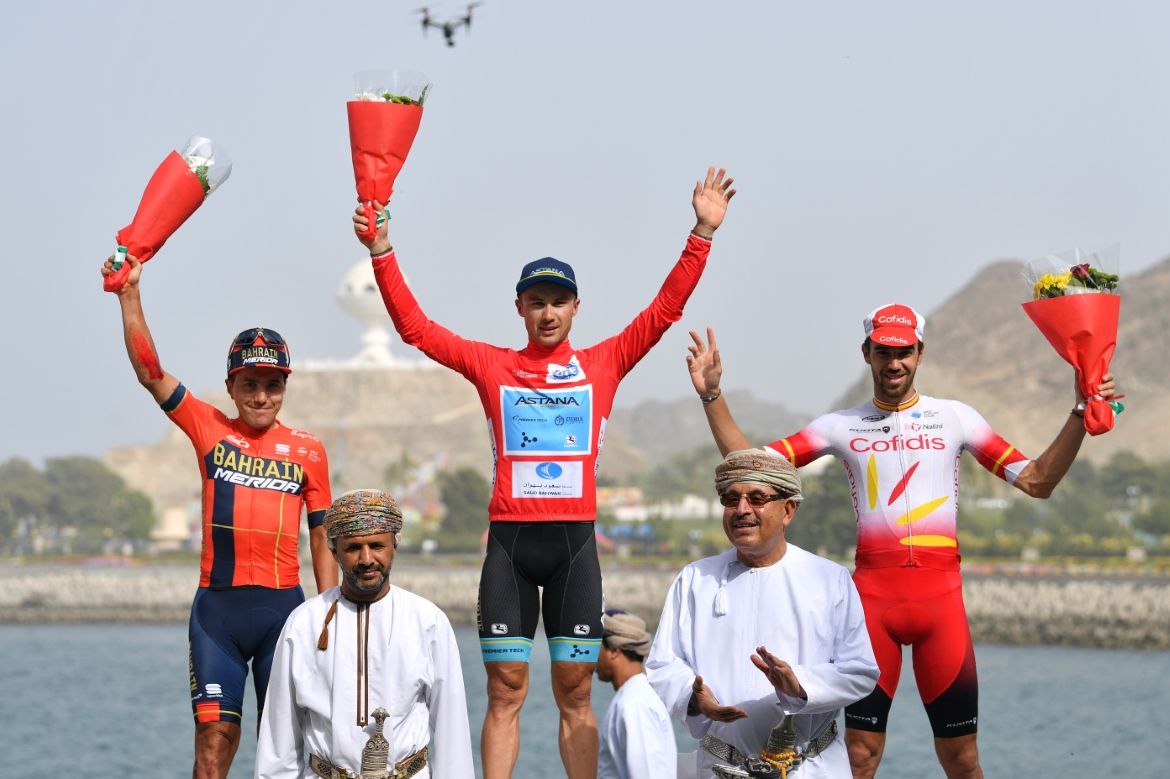 Alexey Lutsenko takes centre stage after winning the Tour of Oman