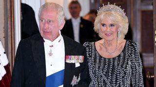 Queen Camilla and King Charles III arrive at a reception and dinner