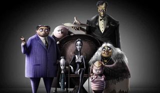 The Addams Family sitting in a portrait formation