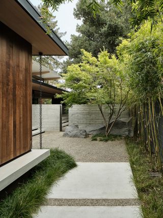 A front yard that mixes gravel and paving