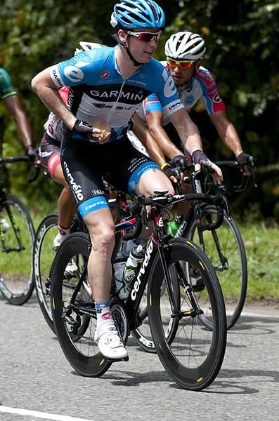 Garmin Barracuda's Raymond Kreder from the Netherlands takes a wet cloth on board to cool himself down in the trying conditions whilst in the breakaway.