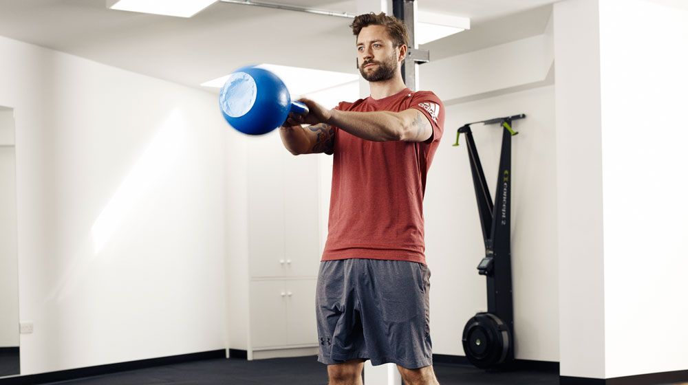 Ashton Turner performing two-handed kettlebell swing