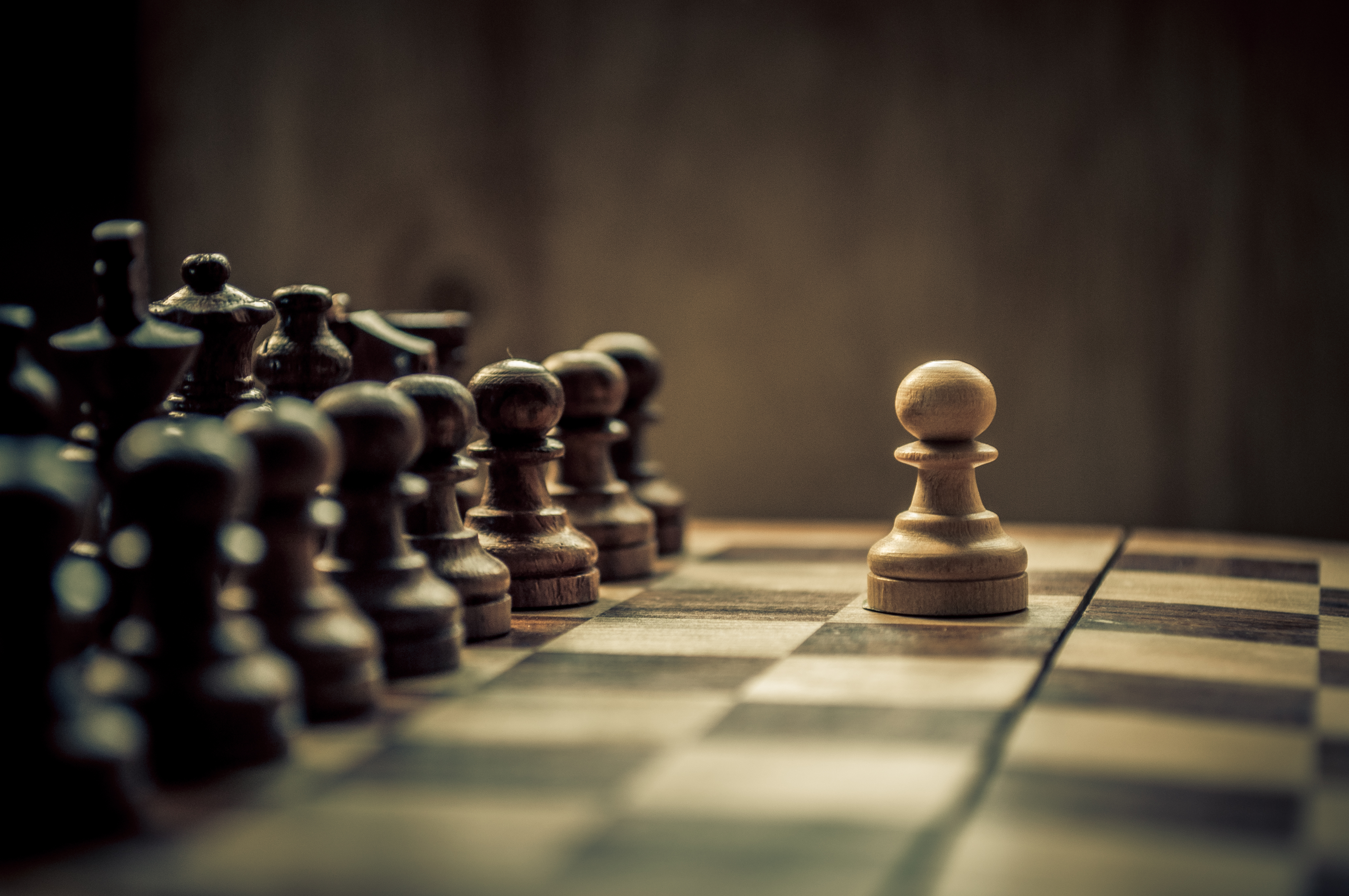 The little boy ponders the next chess move. Stock Photo