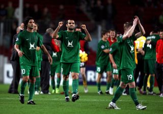 Rubin Kazan players celebrate after beating Barcelona at the Camp Nou in the 2009/10 Champions League group stage