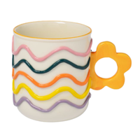 Yellow Flower Handle Mug, £12 | Paperchase