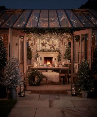 an outdoor room decorated for Christmas