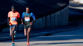 Marathon leaders Albert Korir, left, and Yitayal Atnafu were neck and neck just past mile 24 on Allen Parkway during the Chevron Houston Marathon, Sunday, Jan. 20, 2019