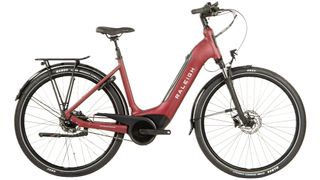 Raleigh Motus Tour in light red with a low step-through frame