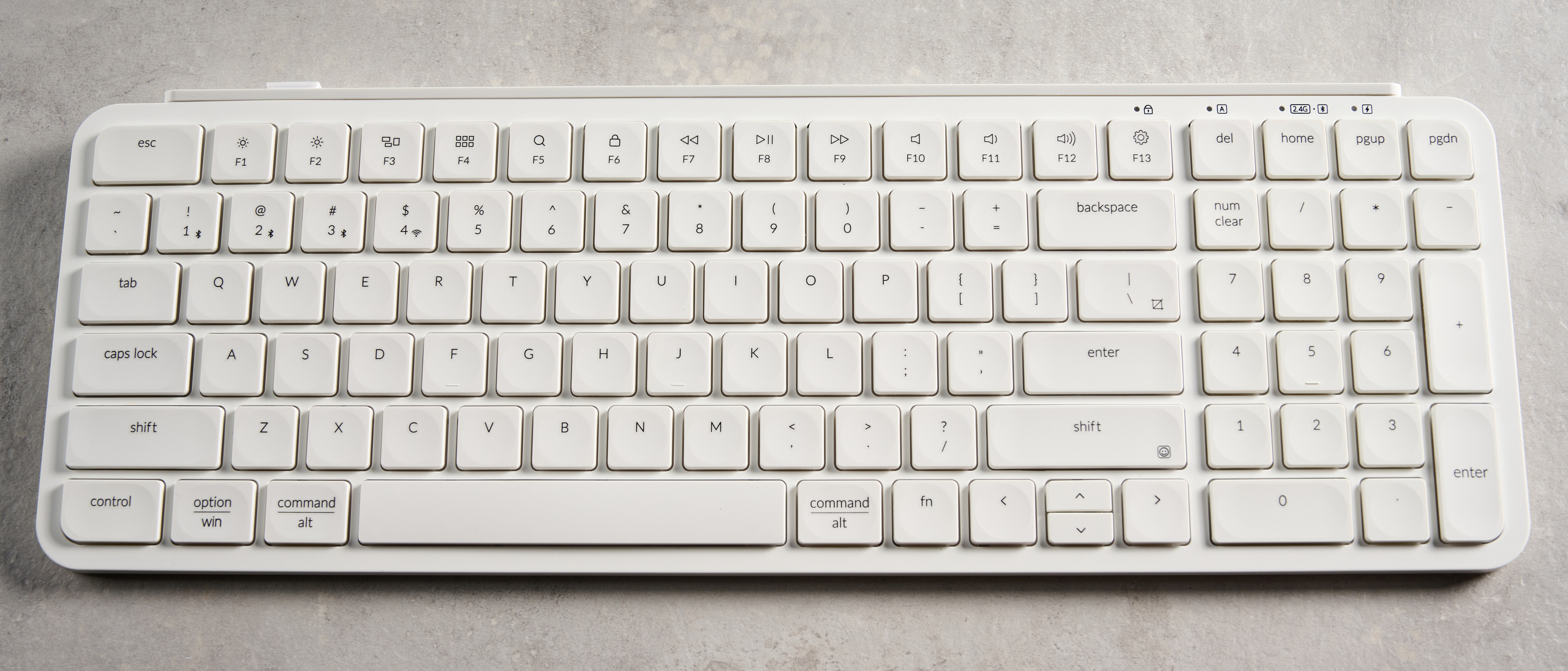 Keychron B2 Pro ultra-slim low profile keyboard in white photographed on a grey background. 