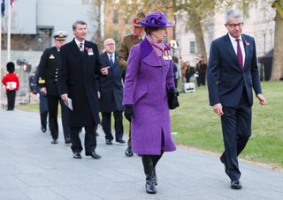 Princess Anne and the New Zealand High Commissioner Bede Corry walk past the Australian war memorial during a dawn service to commemorate Anzac Day