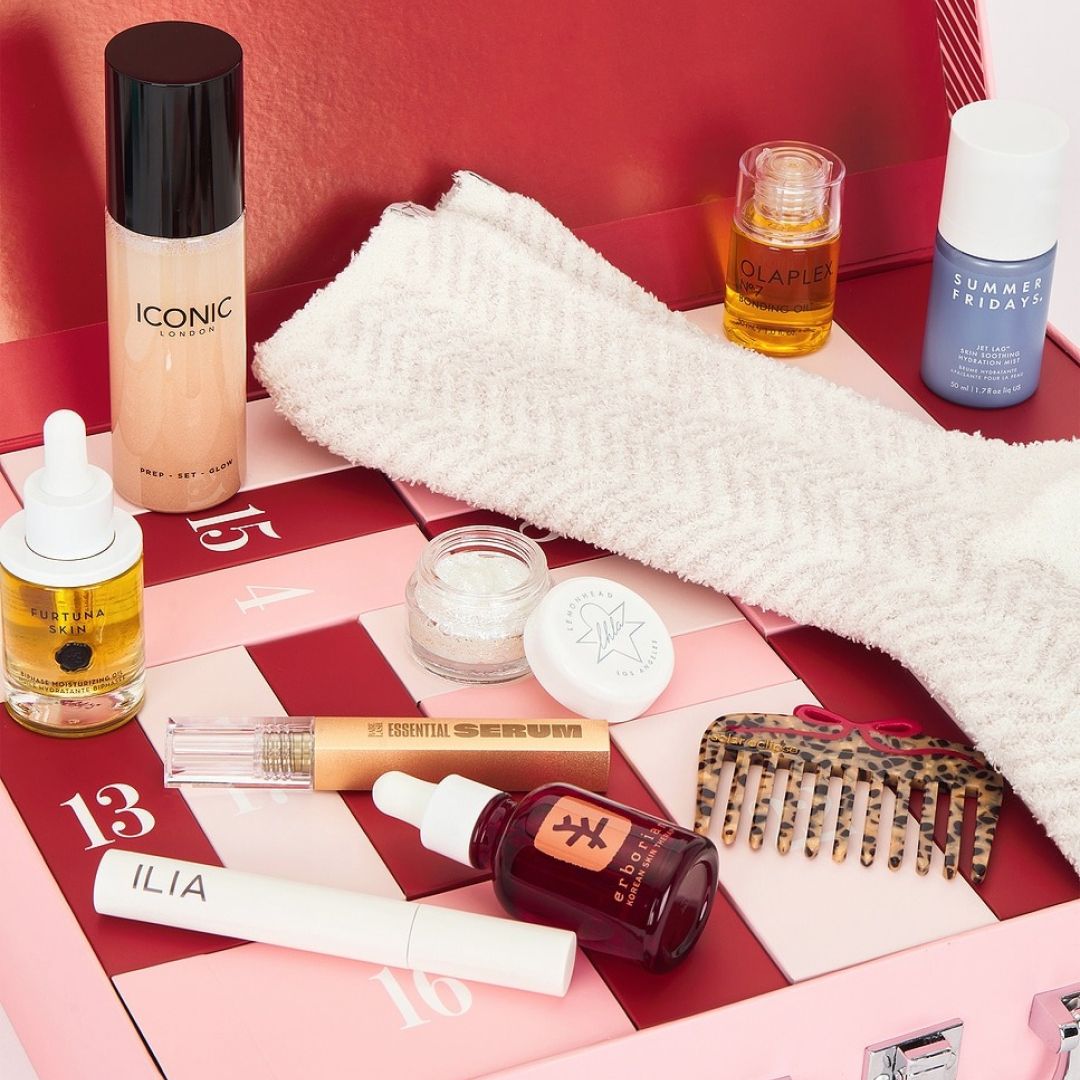 revolve 2025 25-day beauty advent calendar with contents spilled out 