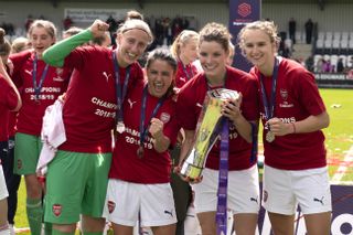 Miedema celebrates WSL title success with a number of her Arsenal and Holland team-mates.