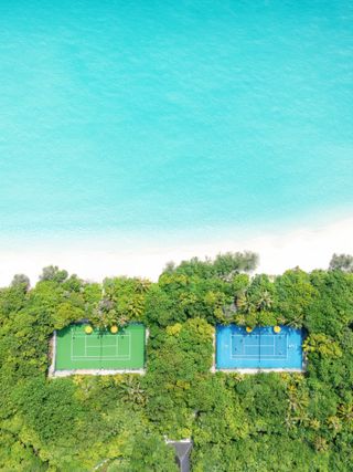 Aerial shot of two tennis courts in Maldives