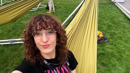 a photo of the author in a lime green music hammock