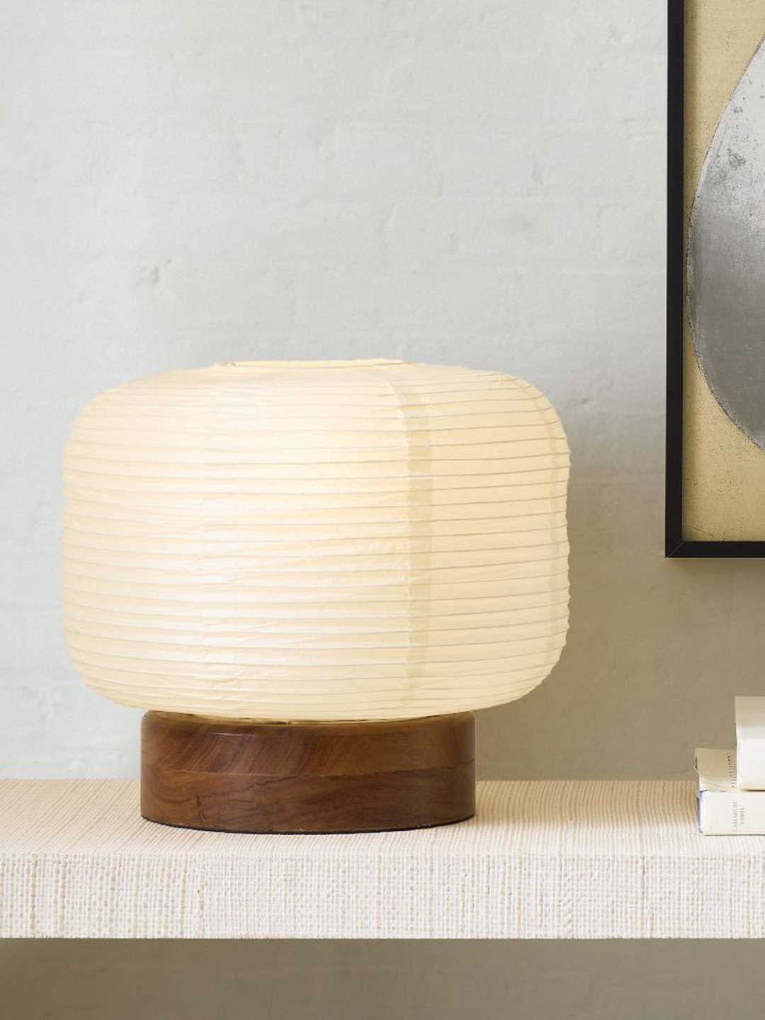 A rice paper table lamp with a wood base from West Elm