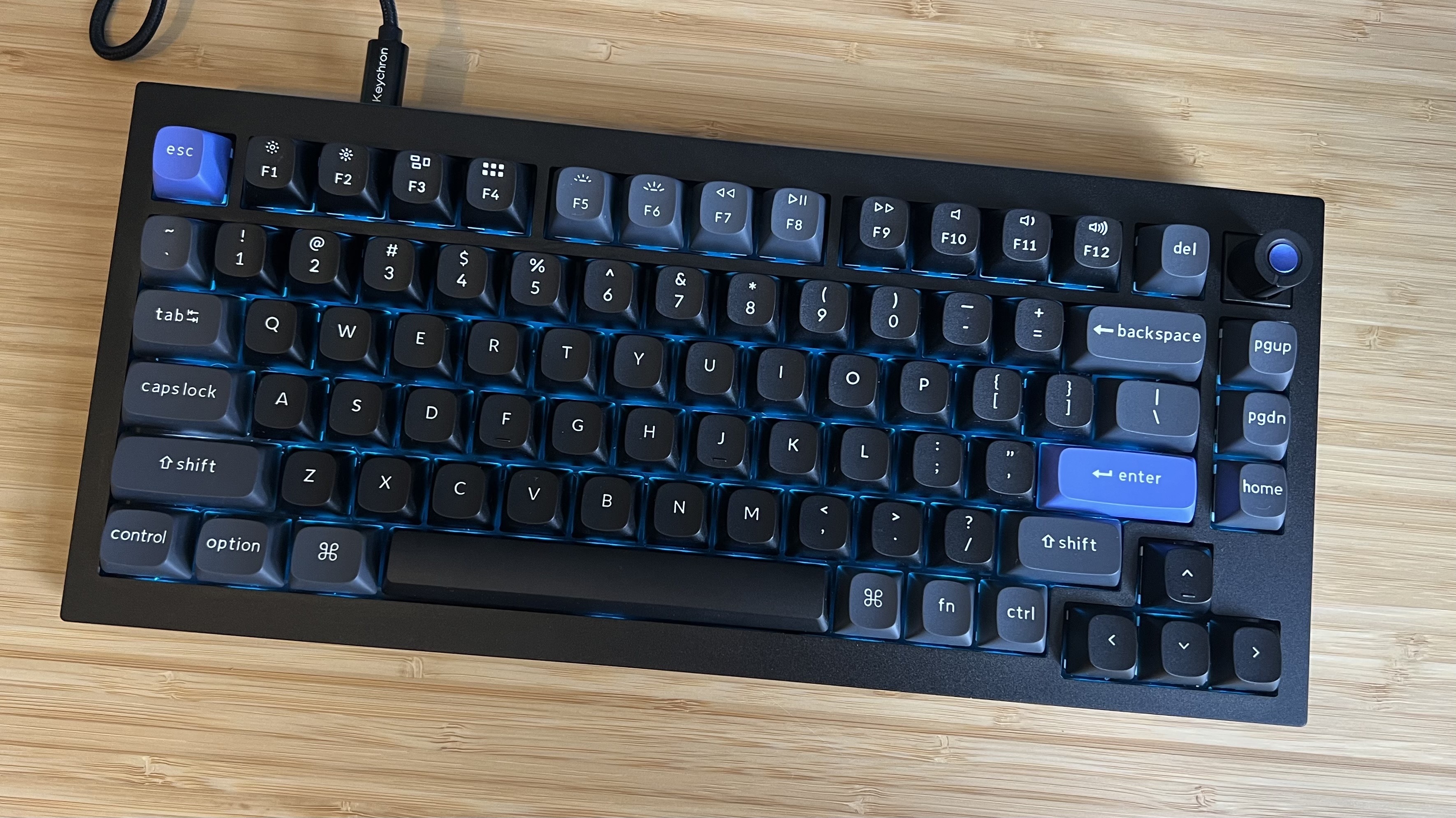 Top down view of Keychron Q1 HE 8K gaming keyboard on a wooden desk