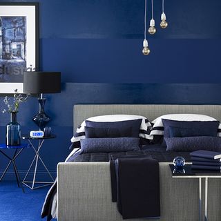 bedroom with blue wall