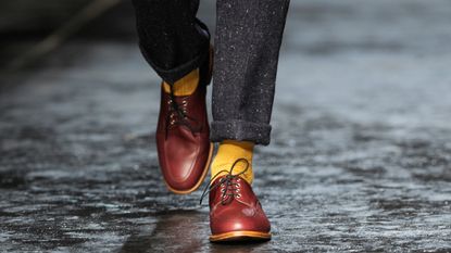 LONDON, ENGLAND - JANUARY 08:A model (detail) walks the runway at the Oliver Spencer show during The London Collections: Men Autumn/Winter 2014 on January 8, 2014 in London, England.(Photo by