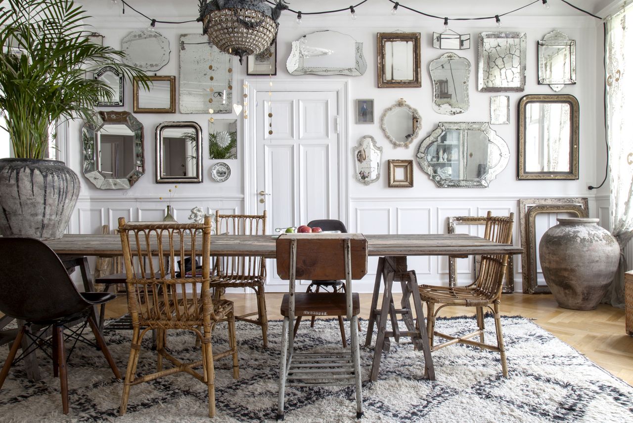 dining room with vintage mirror gallery wall 