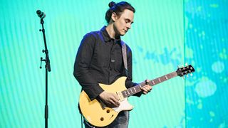 Chris Buck performs on his signature Yamaha guitar during the 2026 NAMM Show Global Media Day at Anaheim Convention Center on January 21, 2026 in Anaheim, California