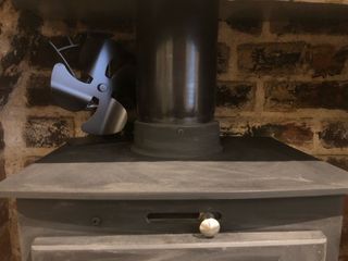A Tomersun stove fan on my log burner