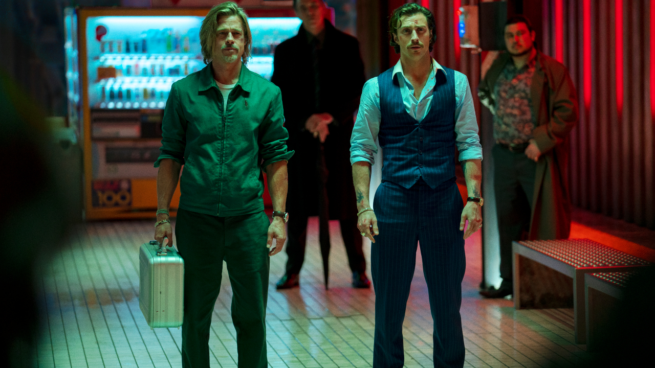 Brad Pitt and Aaron Taylor-Johnson are surrounded by their henchmen at a train station on the bullet train.