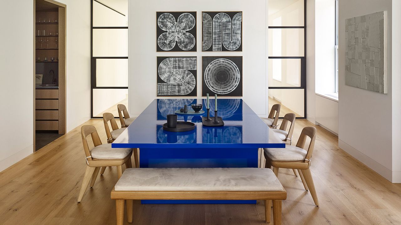  635 Park apartment interior with blue table and artworks on walls