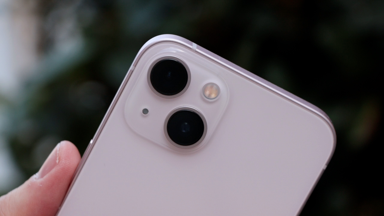 A close-up of the cameras on an iPhone 13