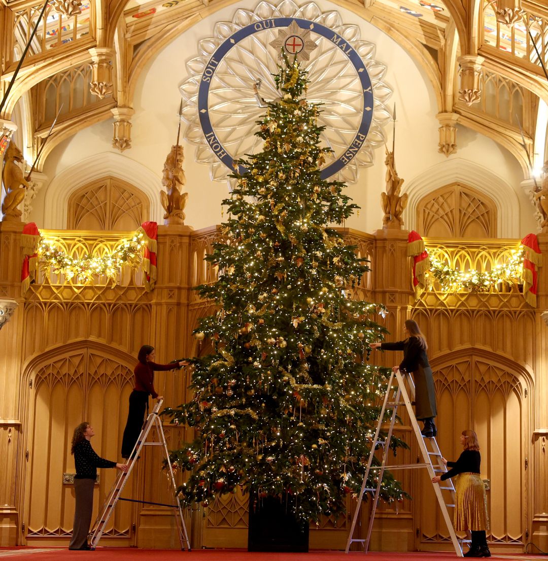 Palace employees decorating a tree at Windsor Castle