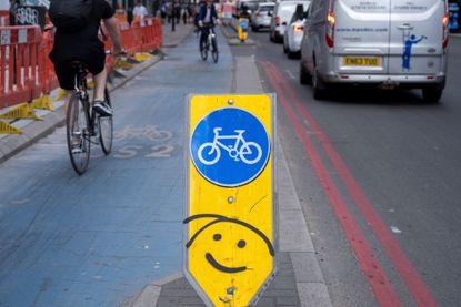 A cyclist in a bike lane in London
