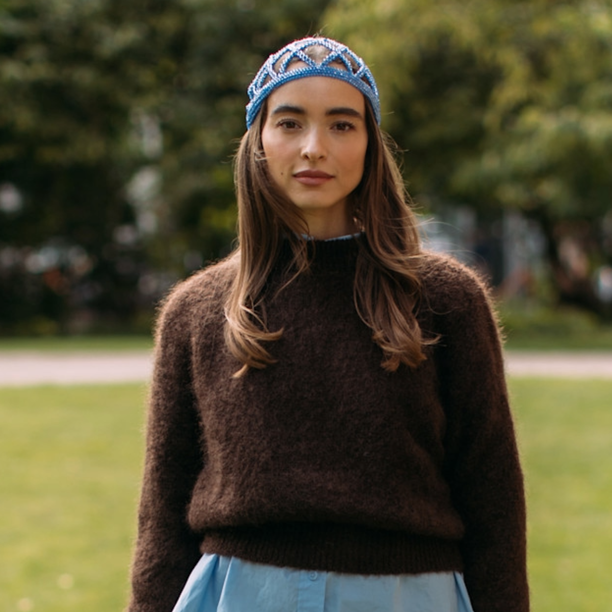 woman wearing a brown sweater in Copenhagen