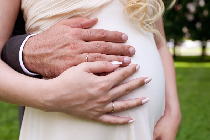 A pregnant bride