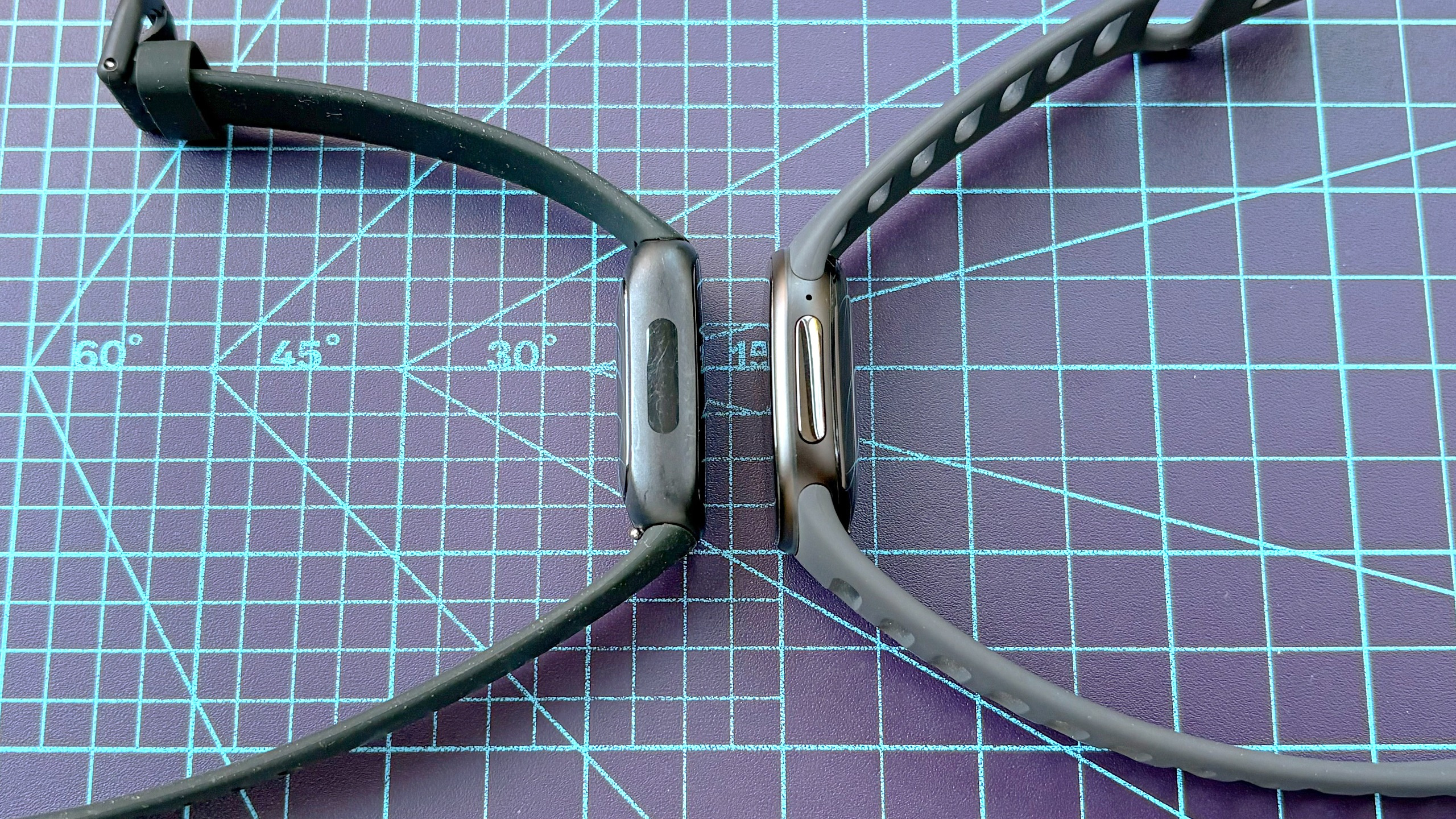 Close-up of the Fitbit Edge next to the Fitbit Inspire 3