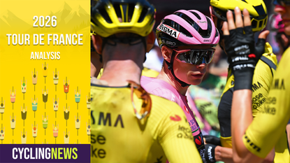 Jonas Vingegaard in pink surrounded by teammates in yellow