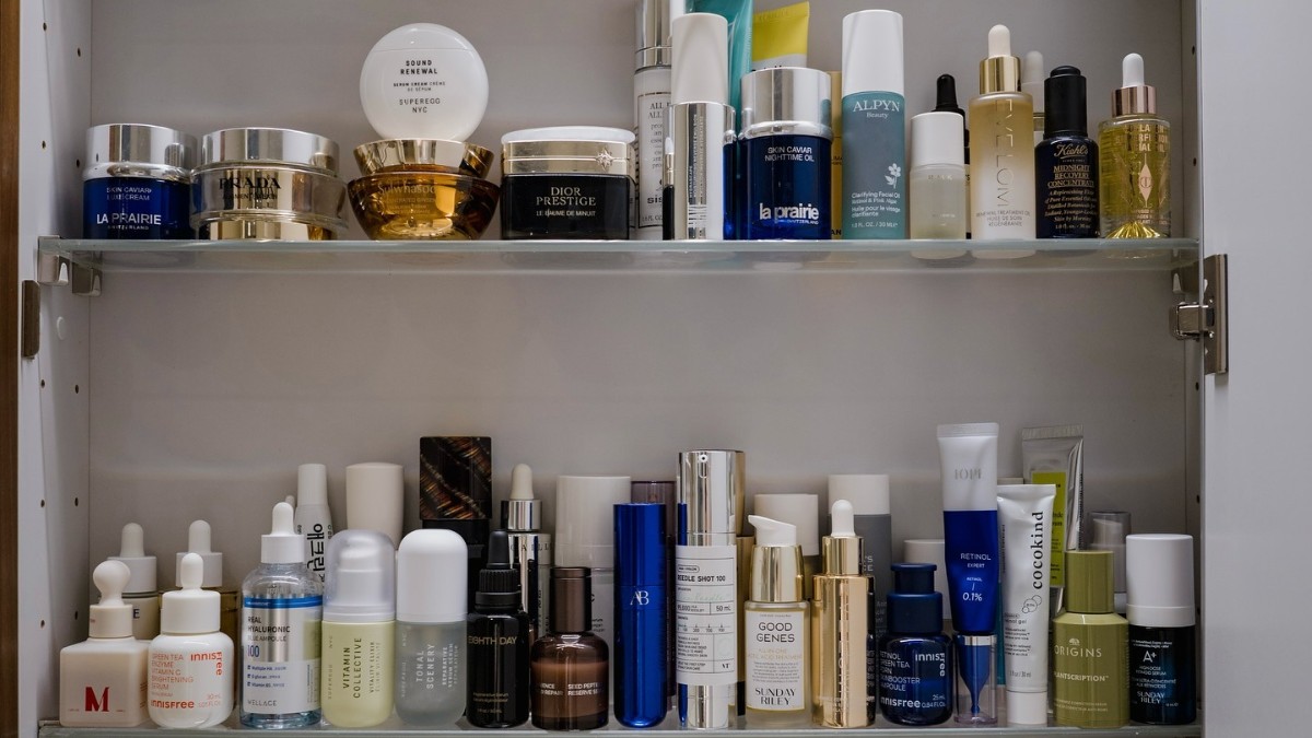 Photo of skincare products on a bathroom shelf