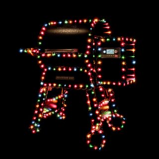 traeger grill lit up by colourful christmas lights