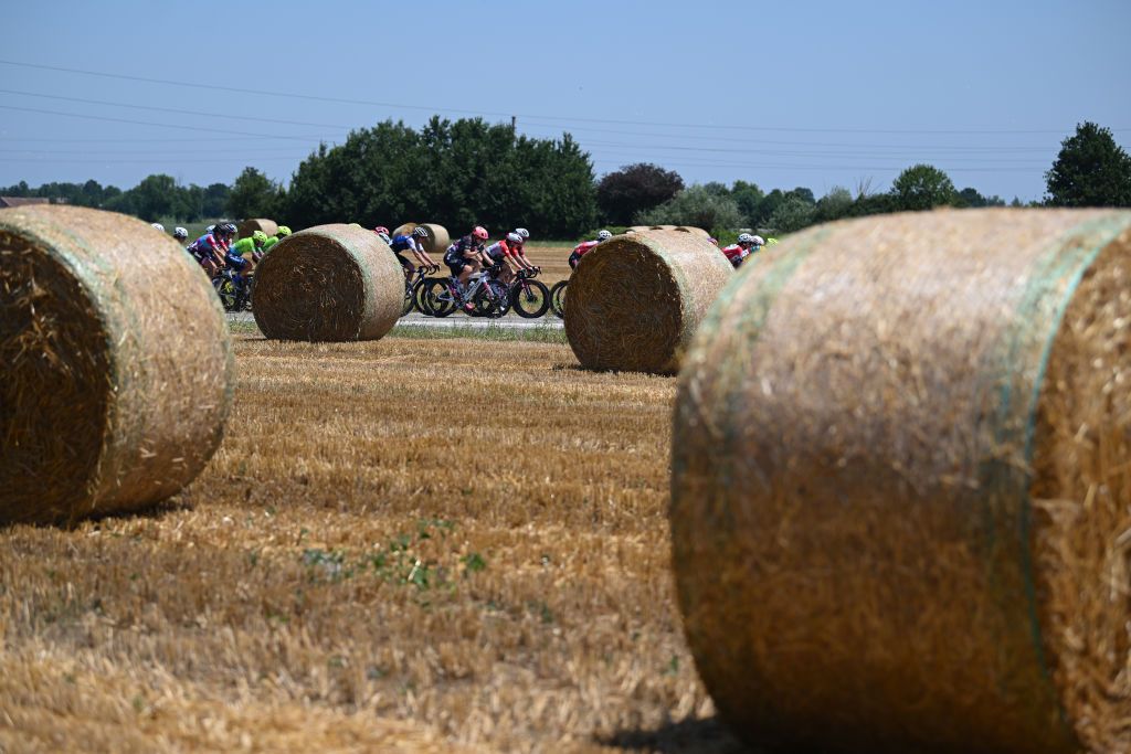 REGGIO EMILIA ITALY JULY 05 A general view of the peloton passing through a landscape during the 33rd Giro dItalia Donne 2022 Stage 5 a 1261km stage from Carpi to Reggio Emilia GiroDonne UCIWWT on July 05 2022 in Reggio Emilia Italy Photo by Dario BelingheriGetty Images