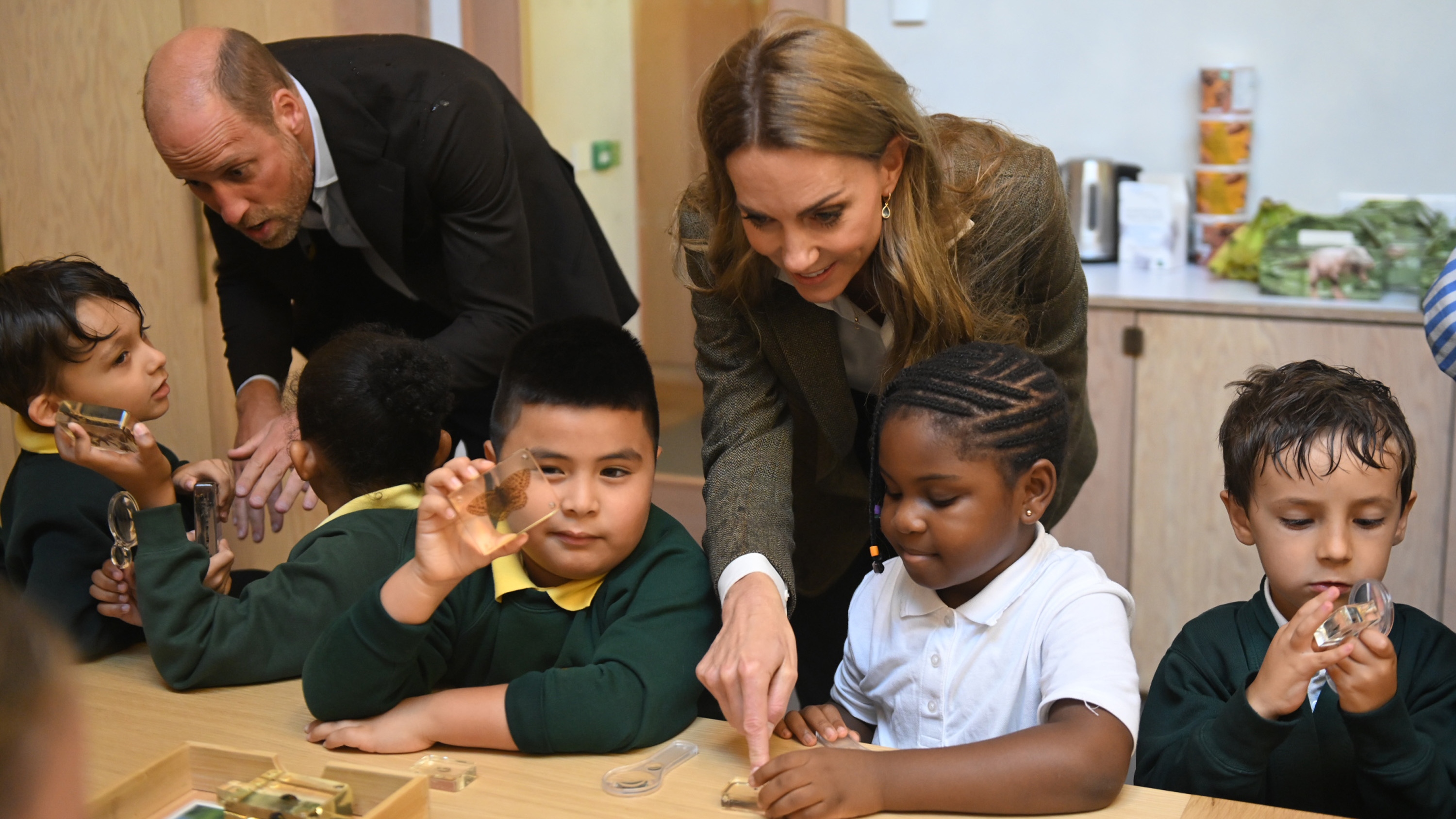 Catherine, Princess of Wales and Prince William talk with children as they visit the Natural History Museum on September 4, 2025