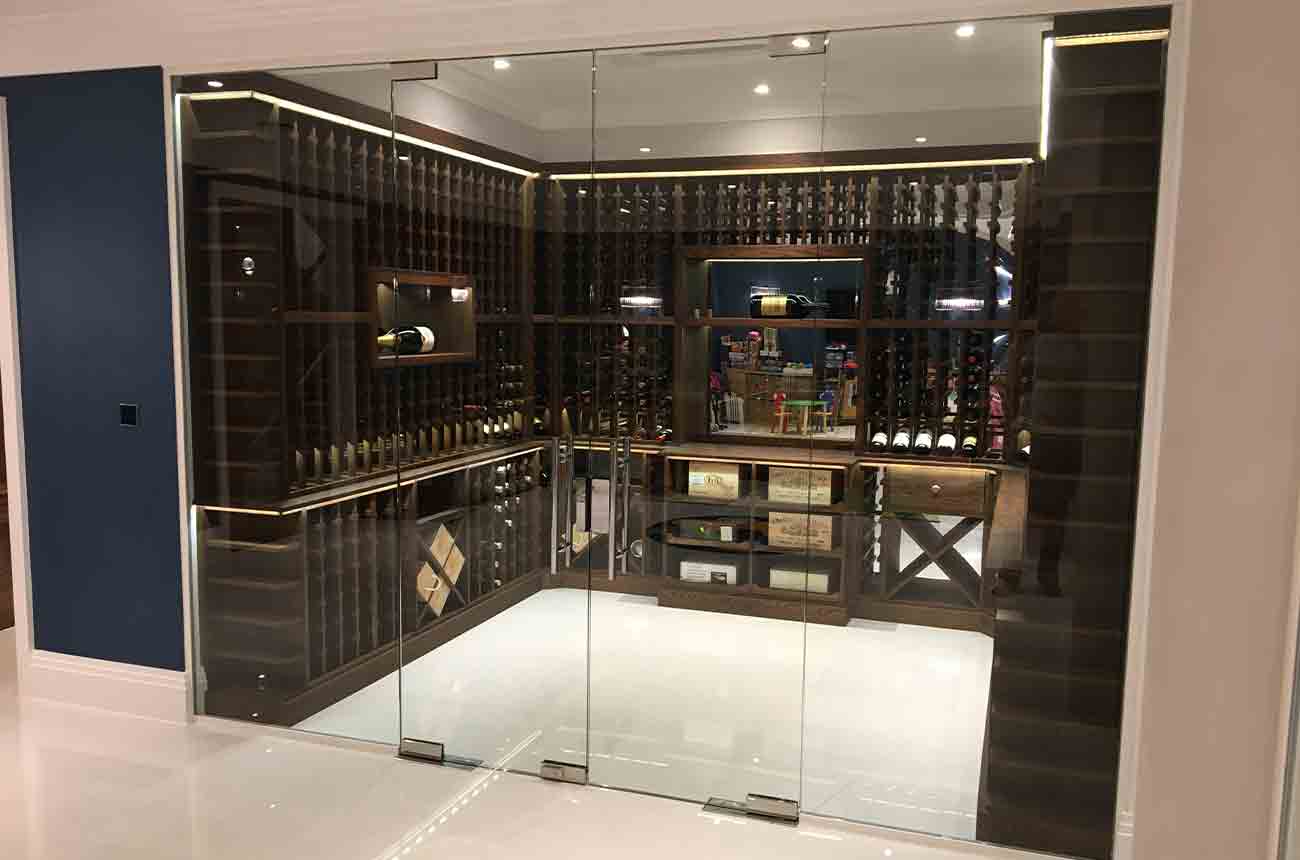 A &amp;amp; W Moore Wine Racks UK's solid oak wine rack in dark oak with LED lights