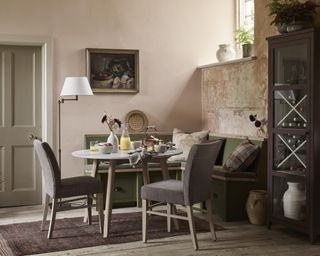 Small dining room area with built-in seating and chairs by Neptune