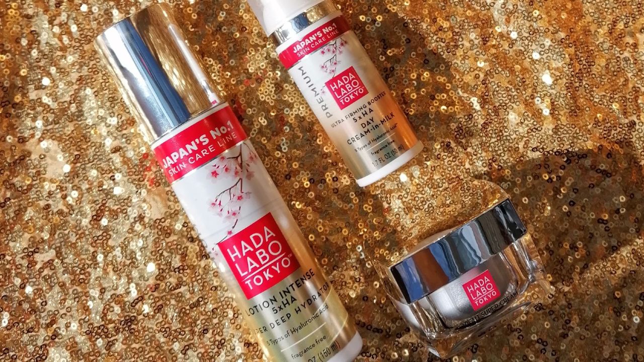 Hada Labo&#039;s Premium Skincare range on gold background flatlay