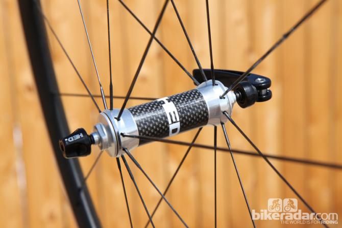 The top-end HED Ardennes Plus SL front hub features a carbon center sleeve and straight-pull flanges pre-slotted for bladed spokes.