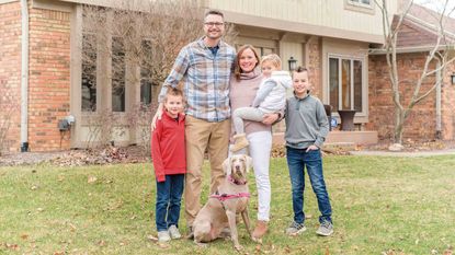 Gillie family outside house